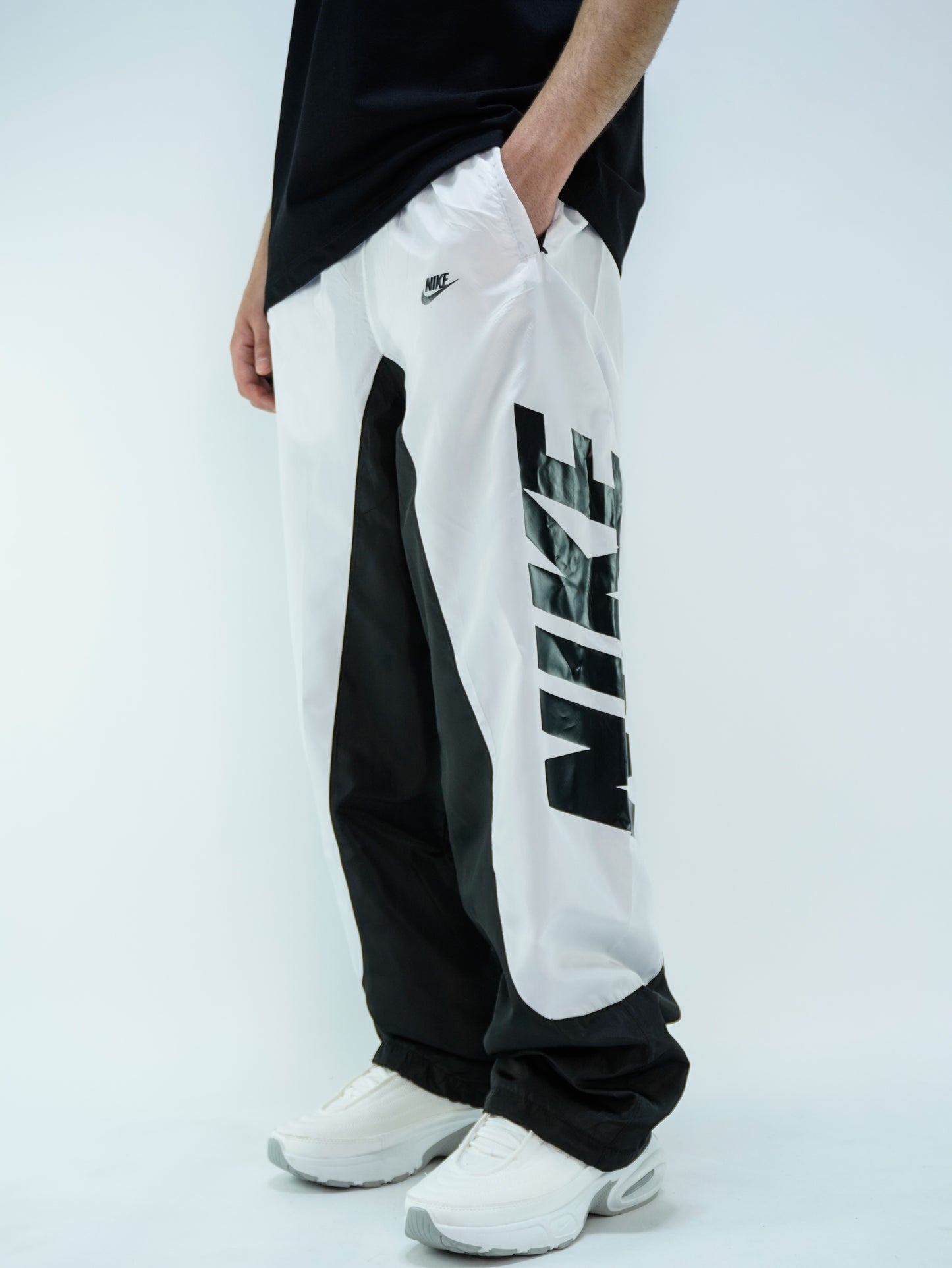 White baggy track pants